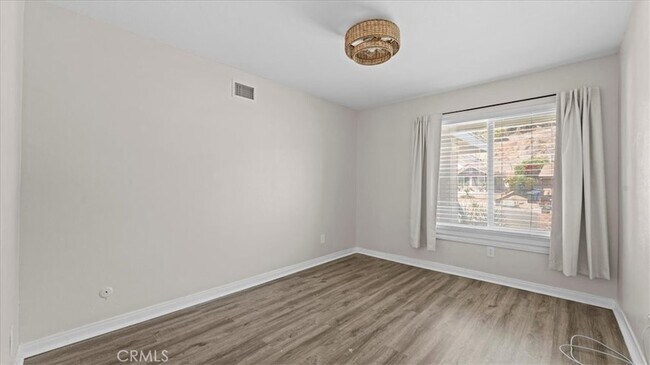 Building Photo - 8250 Whispering Tree Dr