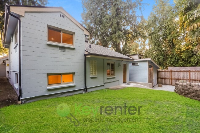 Building Photo - Modern 2-Bedroom Gem with Garage, Shed, an...