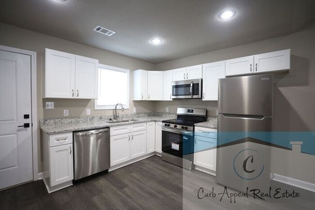 Building Photo - Brand new construction 2 bed 1 bath apartment - includes utlities, washer and dryer!!