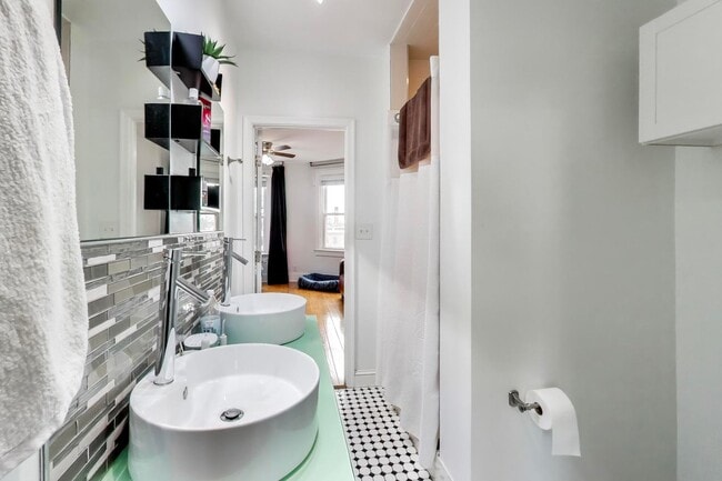 Building Photo - COMING SOON - Sprawling 5 Bed, 3 Bath, Two Kitchens, Dual Back Decks, Two Office/Den Townhouse, 2...