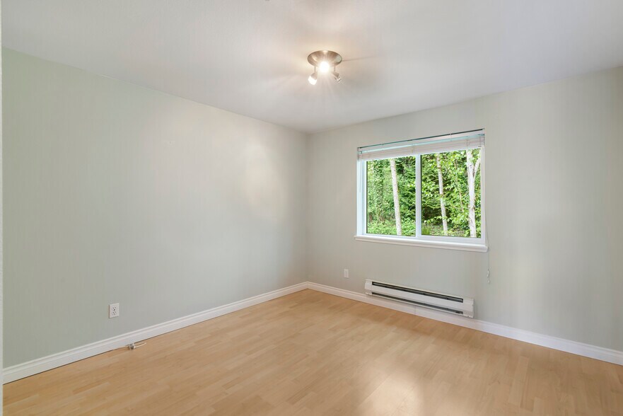 2nd bedroom facing private greenbelt - 9910 NE 137th St