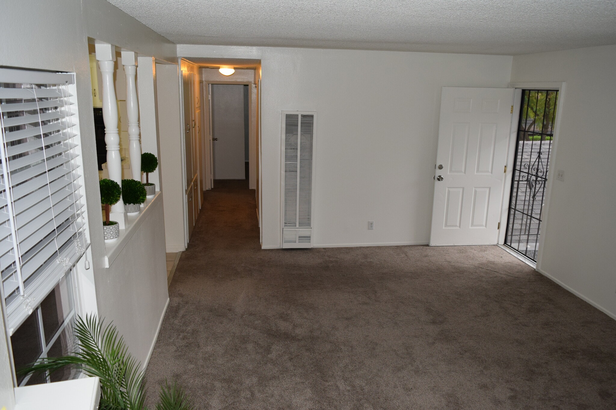 Living Room: Front Door - 1945 Evergreen St