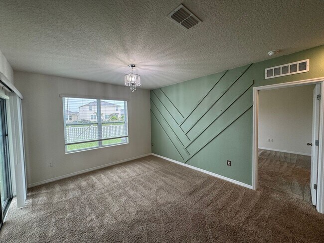 Building Photo - 3BD/2BA Modern Florida Home Living Reimagined — Solar-Powered Elegance Near I-95 in Edgewater! FU...