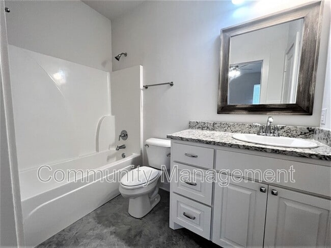 Building Photo - 7677 River Ridge Dr