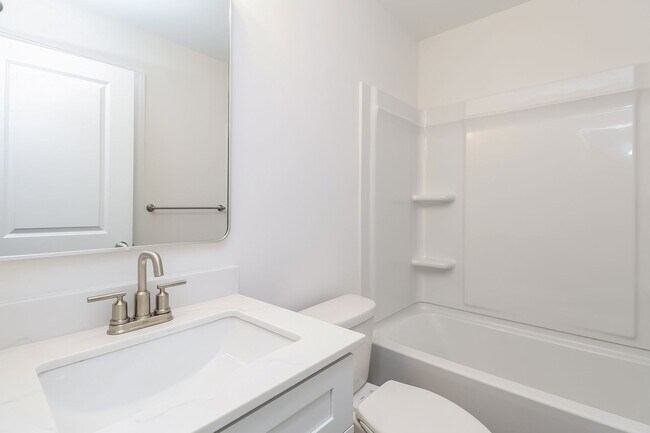 Building Photo - Beautiful 3BR 3.5BA Townhome w/ Full Appliance Kitchen • Garage Parking in West End