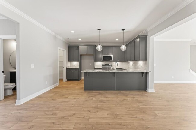 Building Photo - Beautiful New Townhouse in the Heart of Mu...