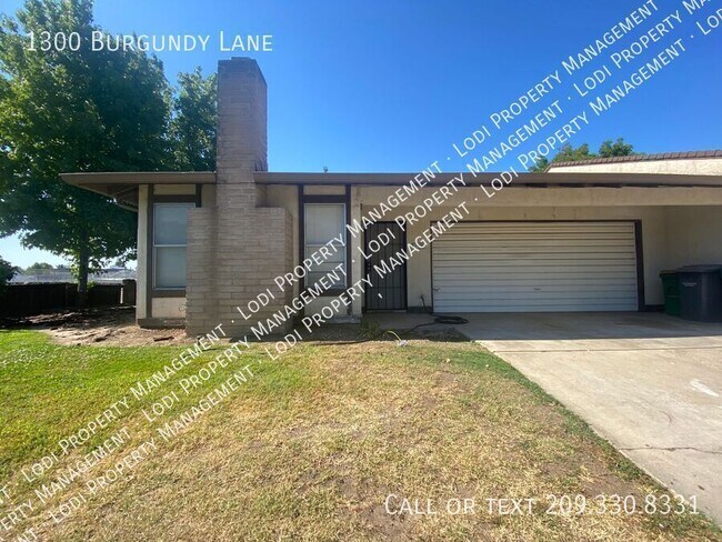 Building Photo - 1300 Burgundy Ln