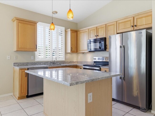 Building Photo - Spacious Living in a Gated Community with Amenities!