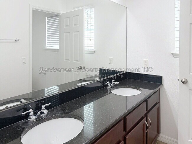 Building Photo - 9428 Woodcrane Dr