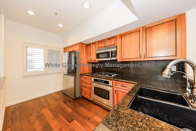 Building Photo - Ocean View Condo Just Steps from Main Street & the Beach – 3 Balconies, Gated Community, Pool & P...