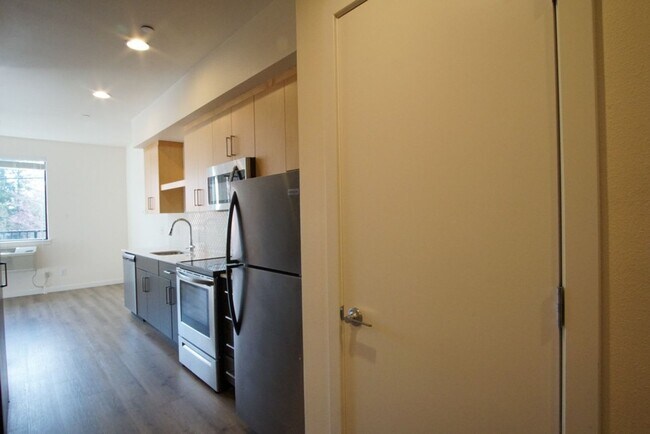 Building Photo - Modern & Chic Corner 1-Bed w/Private Balcony!