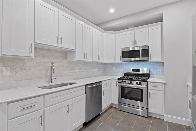 Building Photo - 311-315-315 West Side Ave