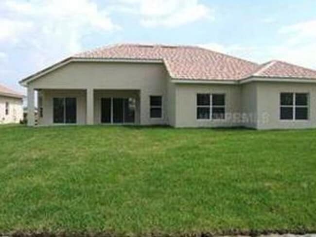 Building Photo - Florida Living Starts Here — Gated, Single-Story, Move-In Ready May 1!