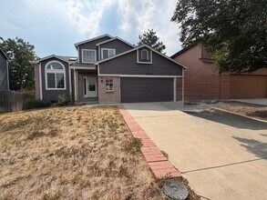 Building Photo - ~Available Now~  Beautiful Four Bedroom Home with Fireplace, Private Yard & Luxurious Primary Suite!