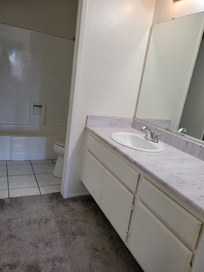 Building Photo - Plenty of Natural Light! Spacious Townhouse conveniently across Dominguez Hills!