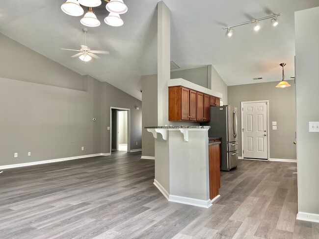 Building Photo - Spacious 3 BR House w/ Fenced Backyard and...