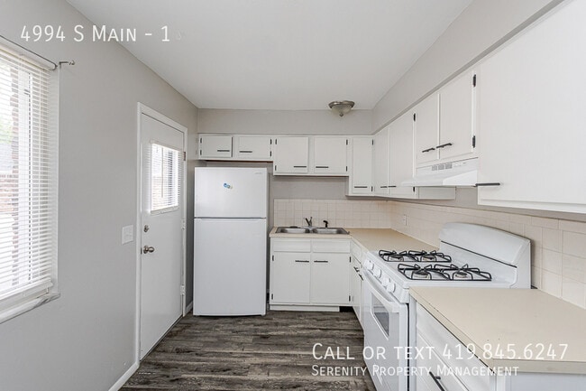 Building Photo - 4994 S Main-1