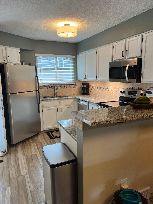 Building Photo - 8743 W Cornell Ave