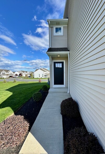 Front Door & adjacent common green space - 1618 Haralson Dr