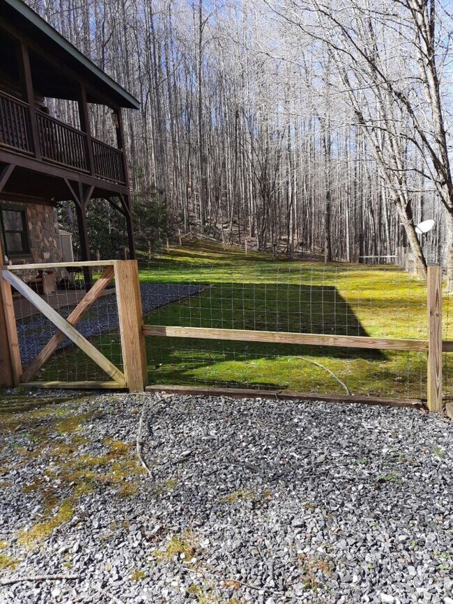 Building Photo - $1,600 - 4 Bedroom 2 Bathroom Furnished Log Cabin on the Creek