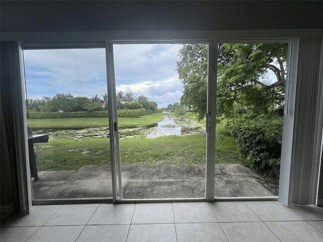 Building Photo - 8969 NW 38th Dr