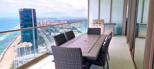 Building Photo - 18975 Collins Ave