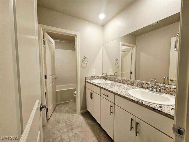 Building Photo - 7497 Blue Lotus Ave