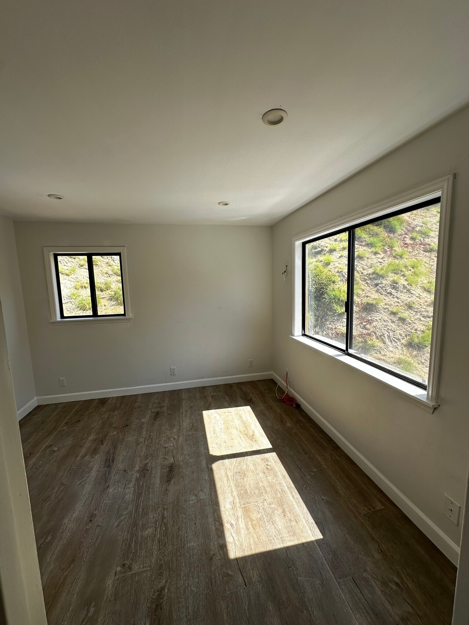 Queen bed fits comfortably with plenty of natural light with Mountain View’s - 8532 Vine Valley Dr