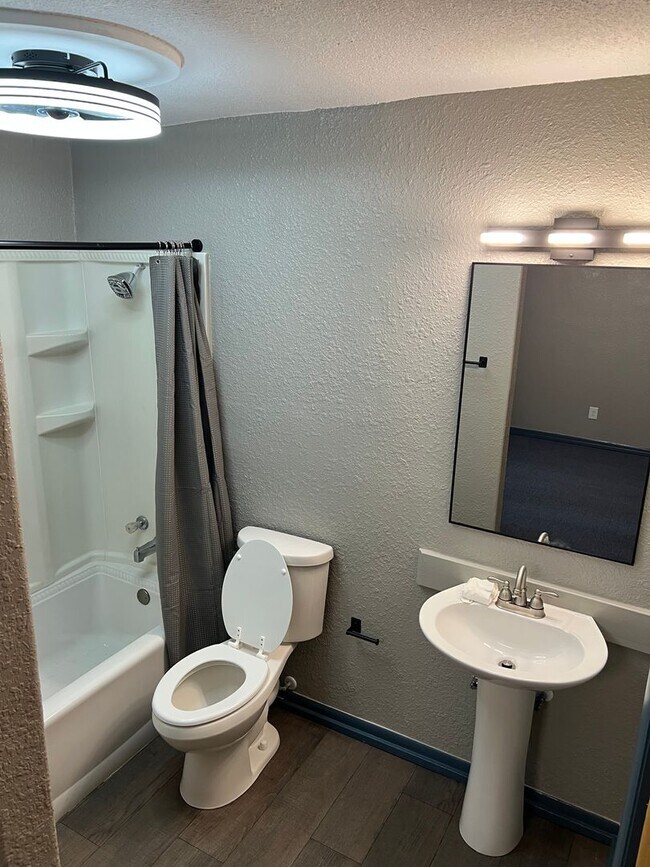 Building Photo - Remodeled Suburban Apartment