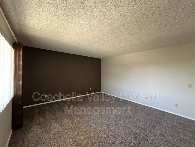 Building Photo - 1950 S Palm Canyon Dr