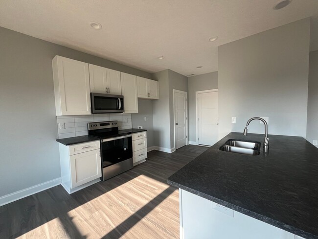 Building Photo - Three bedroom new construction home close ...