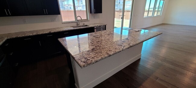 Building Photo - Stunning home with luxurious wood floor and beautiful spacious yard