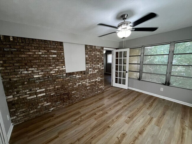 Building Photo - Must See the Sunroom off the Primary Bedroom!