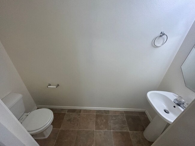 Building Photo - 2 bedrooms 1.5 bathroom with large living room, large kitchen PLUS 1 car garage. Bedrooms are huge