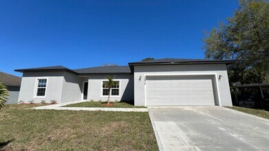 Building Photo - Spacious 3BD/2BA Palm Bay Home – Modern Comfort & Great Location!