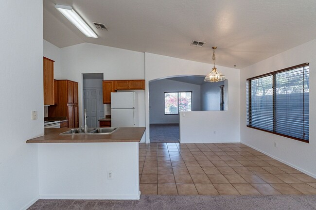 Building Photo - Three bedrooms! Fresh Carpet and Paint!