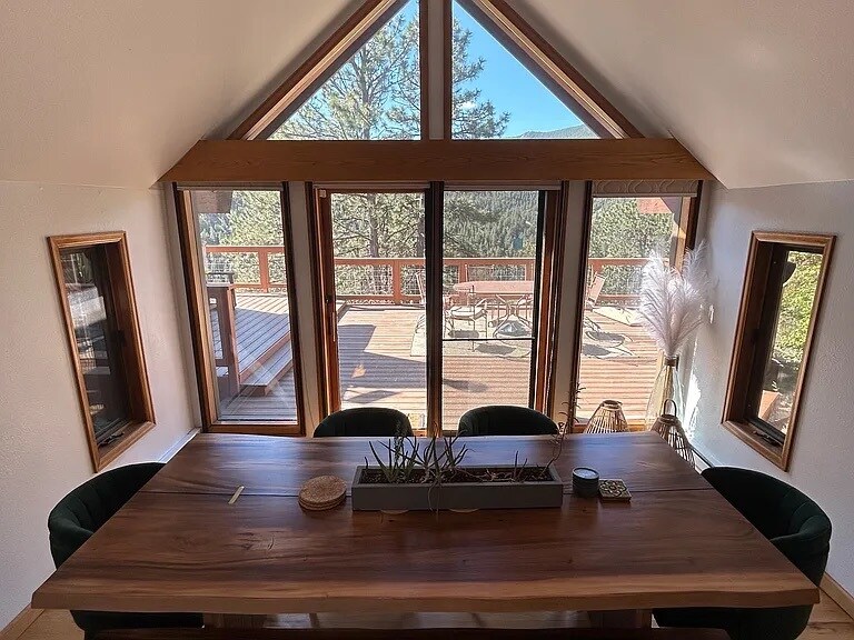 Dining room with door to back deck - 519 Sugarloaf Rd