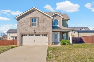 Building Photo - Pet Friendly Three Bedroom with Bonus!