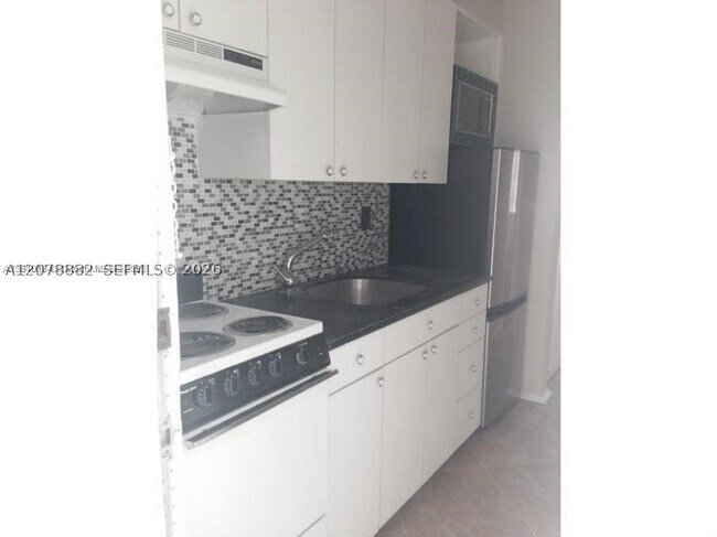 Building Photo - 9920 Collins Ave