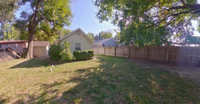Building Photo - 3D Tour Available - Newer Flooring + Large Fenced-in Yard! Available July 3rd!