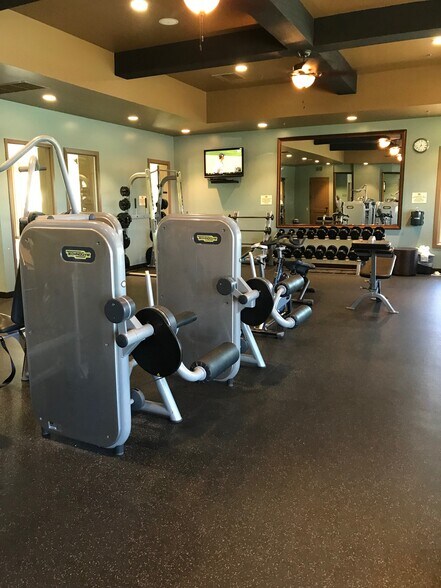 Work out facilities, free for residents! There is also a game room with pool table and ping pong table! - 84126 Canzone Dr