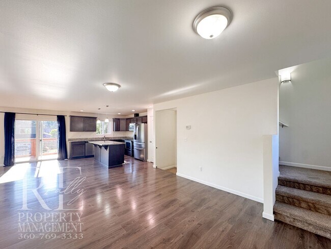 Building Photo - Spacious 3-Story Home with Flexible Living Space, Heat Pump & Private Deck Retreat