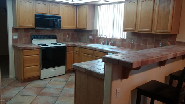 Building Photo - 5839 W Electra Ln