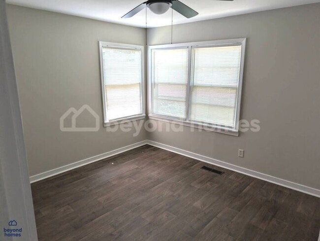 Building Photo - Updated Bungalow with Massive Deck and Fully Fenced Yard!