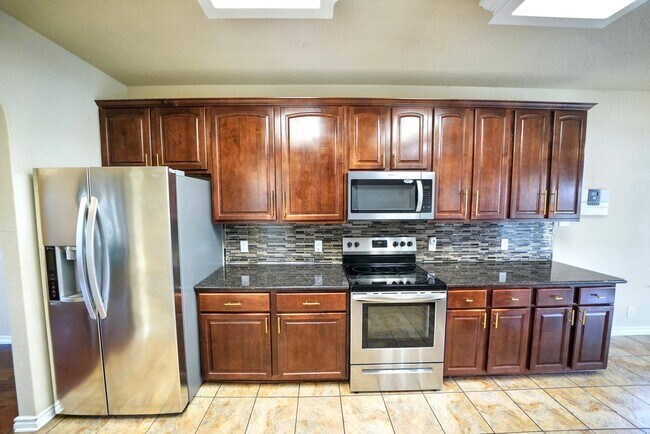 Building Photo - Gorgeous 5-Bedroom, 3.5-Bathroom Home Near...