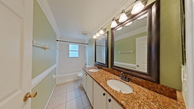 Building Photo - Spacious 6-Bedroom Pool Home with Open Floor Plan & Private Master Suite