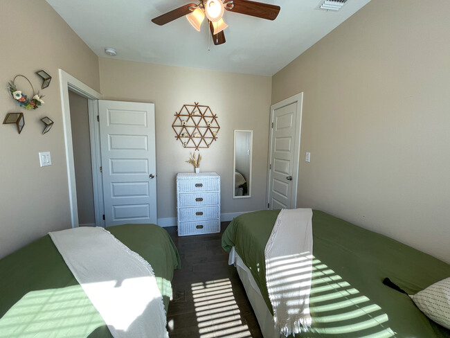 Guest bedroom showing Chester drawers. - 422 S Olive St