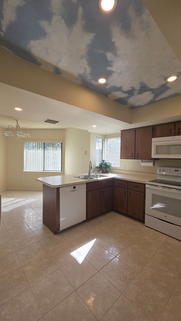 Building Photo - Beautiful Pond Front 2 Bedroom 2 Bath Townhome in the Wood Haven Community