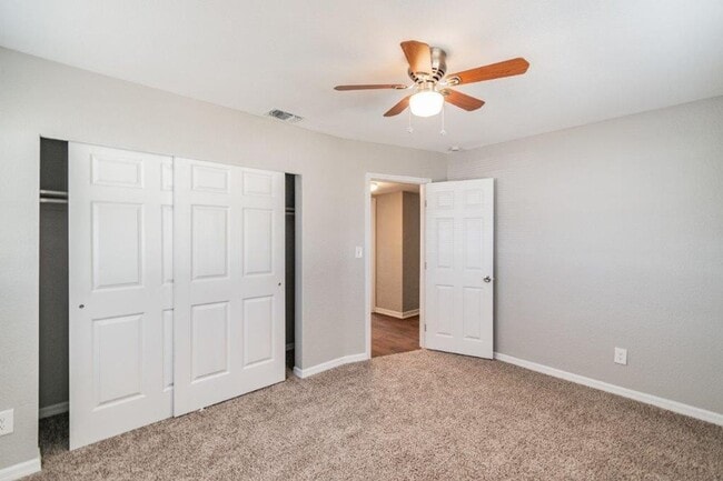 Building Photo - PRICE JUST REDUCED 3/2/1 1389 Sq. Ft. on a...