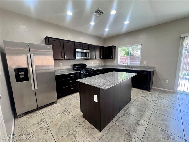 Building Photo - Gated Providence Home with Huge Backyard & Great Room Layout